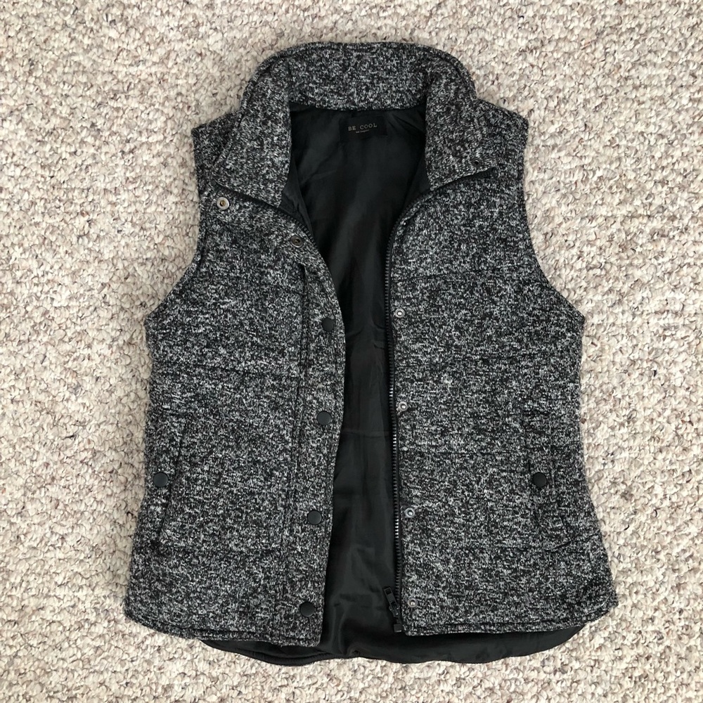 Black and gray speckled puffer vest
